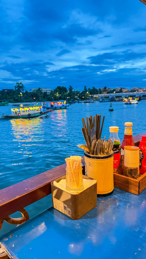 Floating Boat 127 restaurant on river in Hoi An Vietnam

