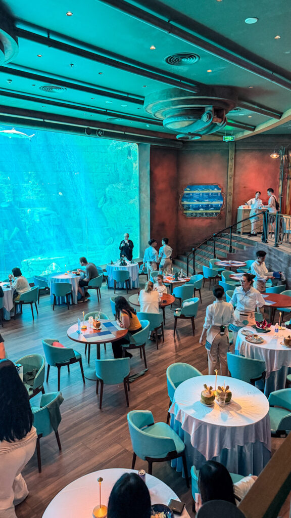 Deep Sea Restaurant VinWonders Phu Quoc sharks swimming underwater