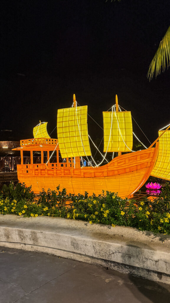 Lantern-lit street at Hội An Impression Theme Park during evening hours