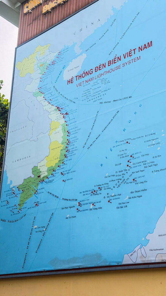 Vung Tau Lighthouse and coastal scenery from Small Mountain