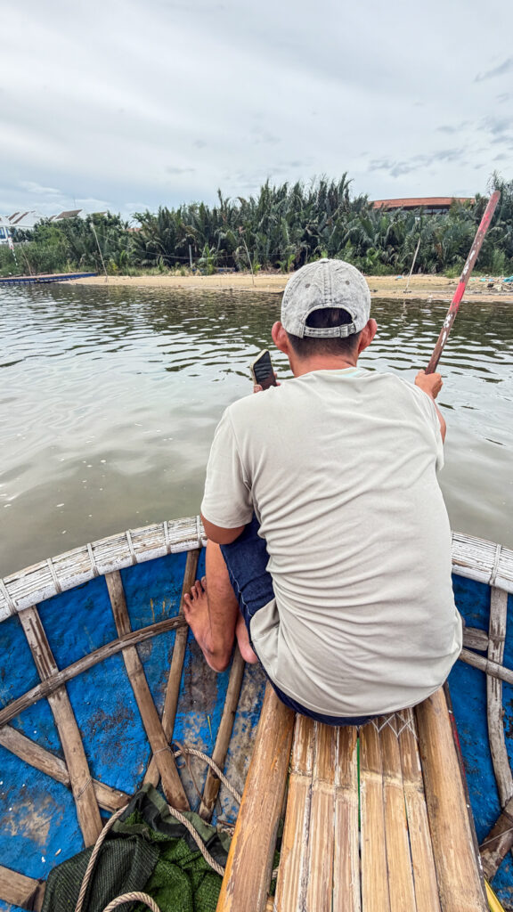 Round bamboo basket boat on nipa palm river Hoi An

