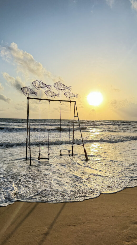 Sunset Sanato Phu Quoc giant elephant sculptures on stilts at sunset