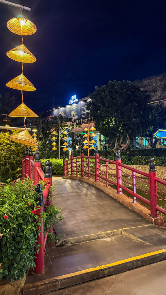 Citadel Gate at Hội An Impression Theme Park with nine dragon pillars and traditional architecture