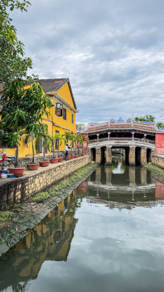 Japanese Bridge with temple inside and dog statues Hoi An

