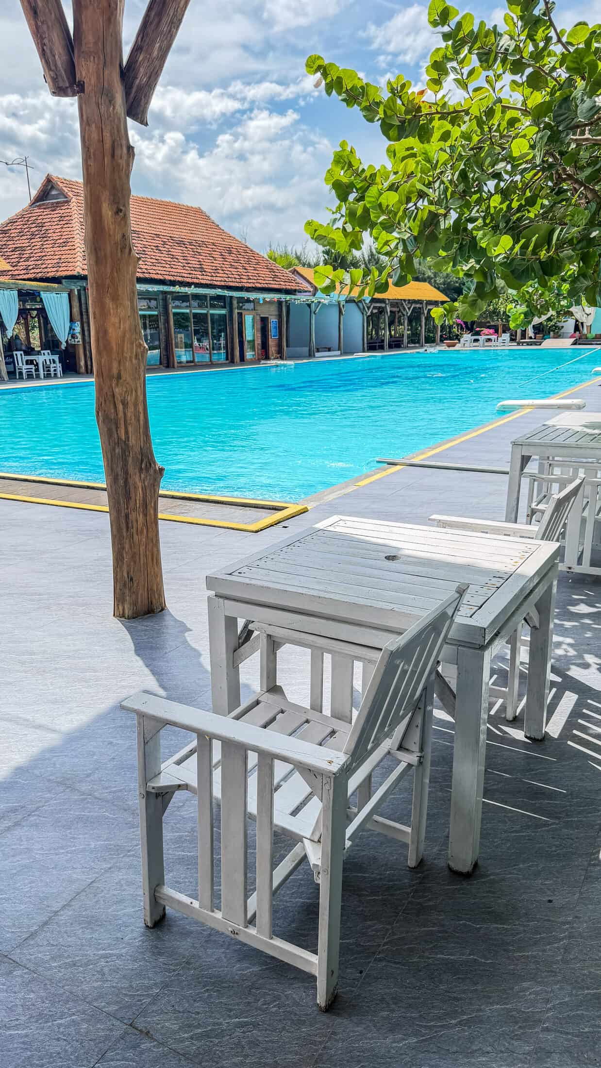 Poolside seating area at Ana Resort Phu Yen