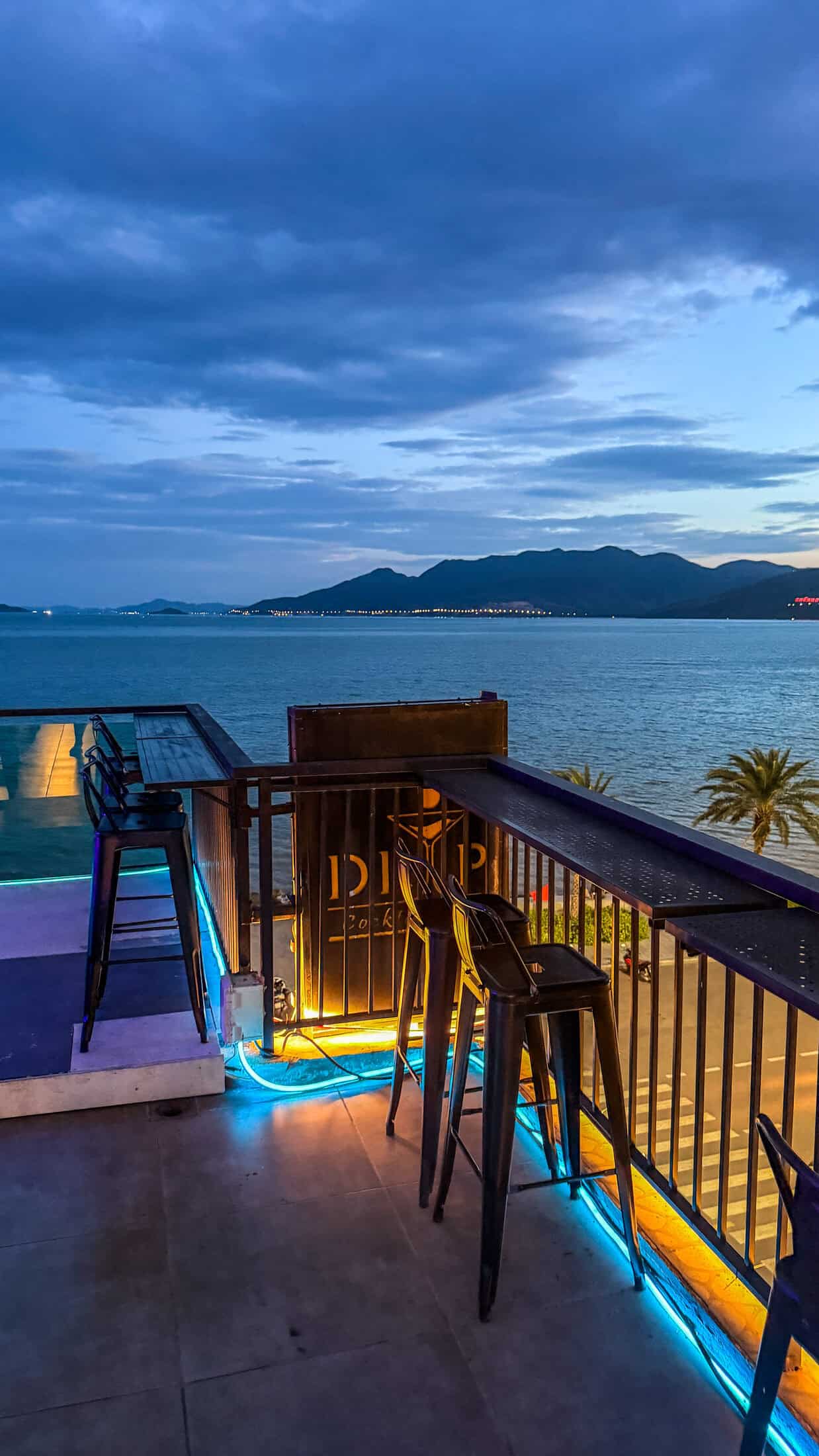Balcony view of the promenade at dusk at DRIP Cocktail & Bar, Quy Nhon