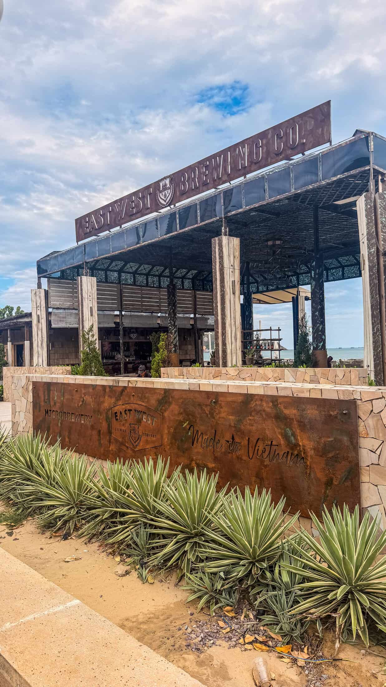 Signage and entrance at East West Brewing Co., Quy Nhon