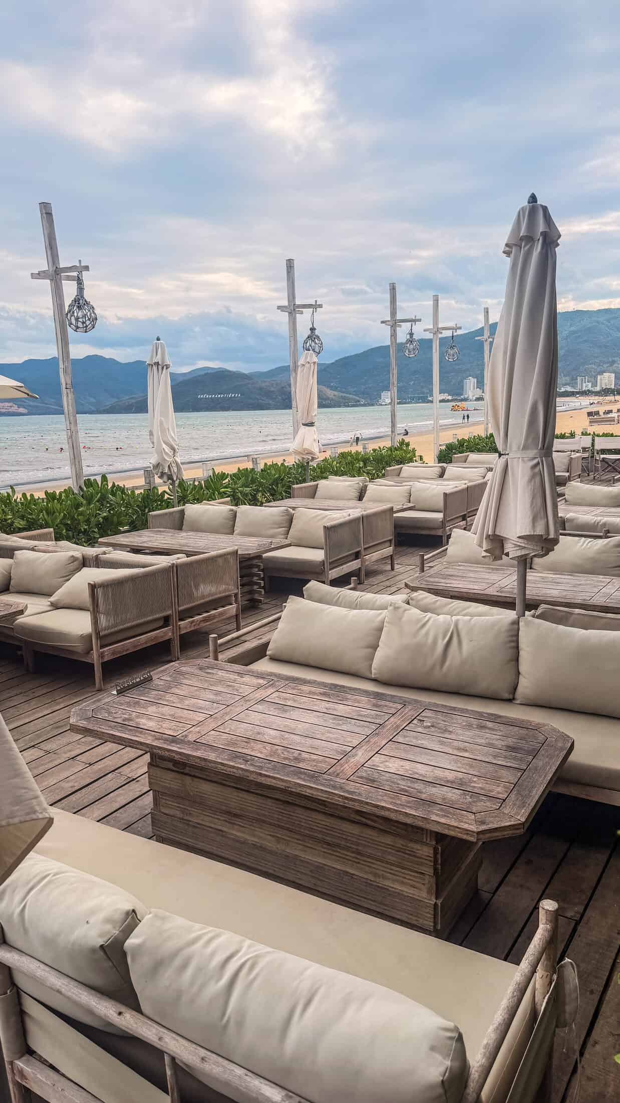 Open-air brewery seating facing the sea at East West Brewing Co., Quy Nhon