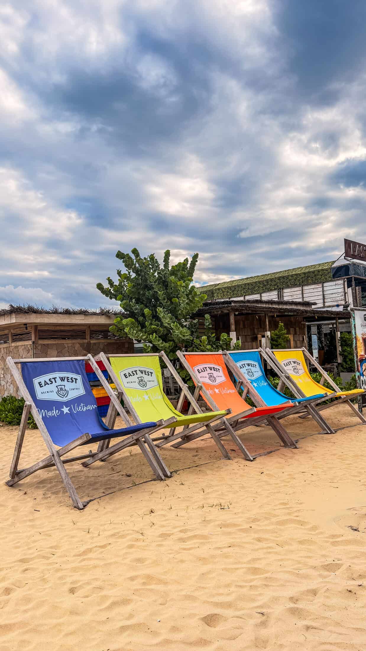 Open-air brewery seating facing the sea at East West Brewing Co., Quy Nhon