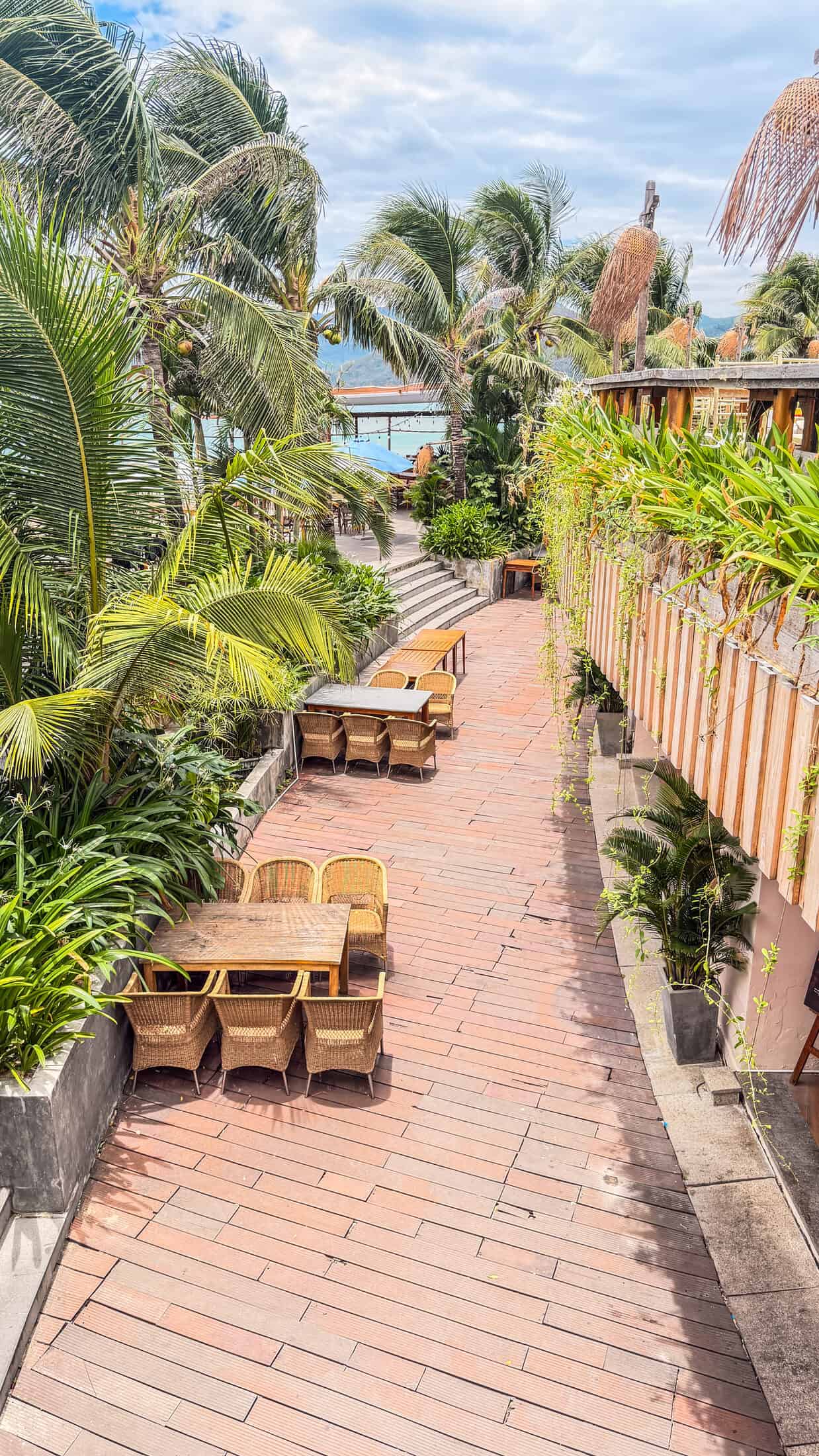 Terraced garden pathway leading toward the sea at Bốn Mùa (Four Seasons), Quy Nhon