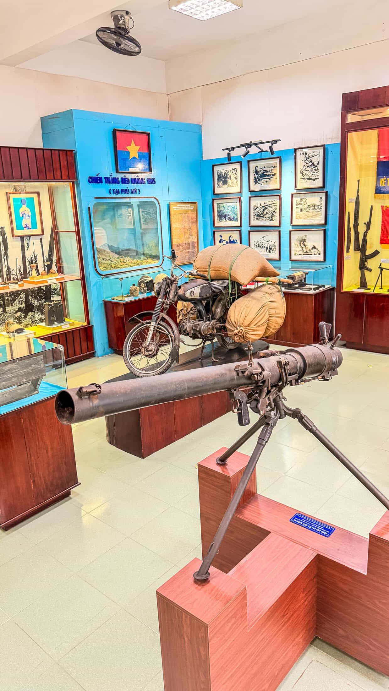 Museum display case with cultural artifacts, Gia Lai Museum