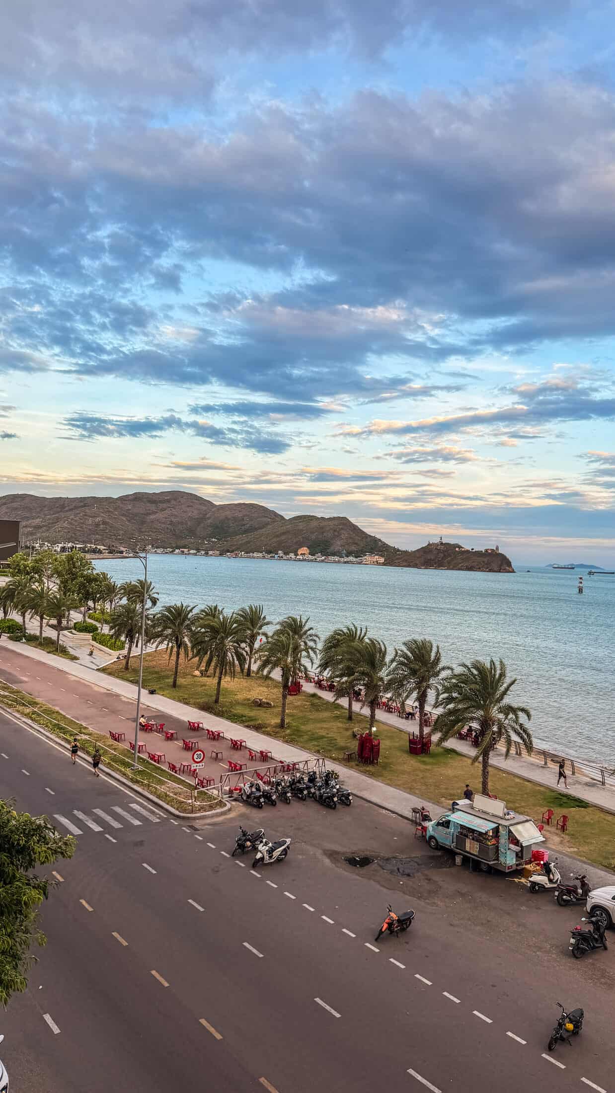 Sunset colors over Quy Nhon's skyline from the promenade