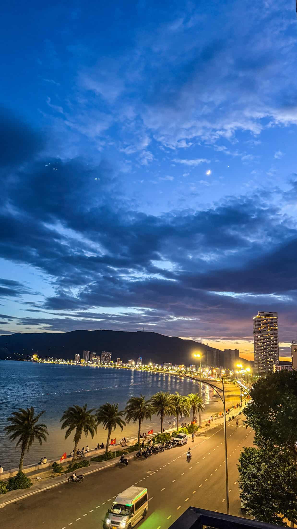 Quy Nhon's promenade towers lit up after dark