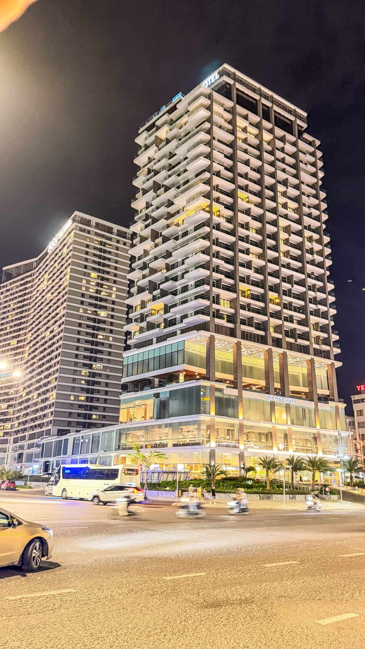 Quy Nhon promenade at night with illuminated high-rises