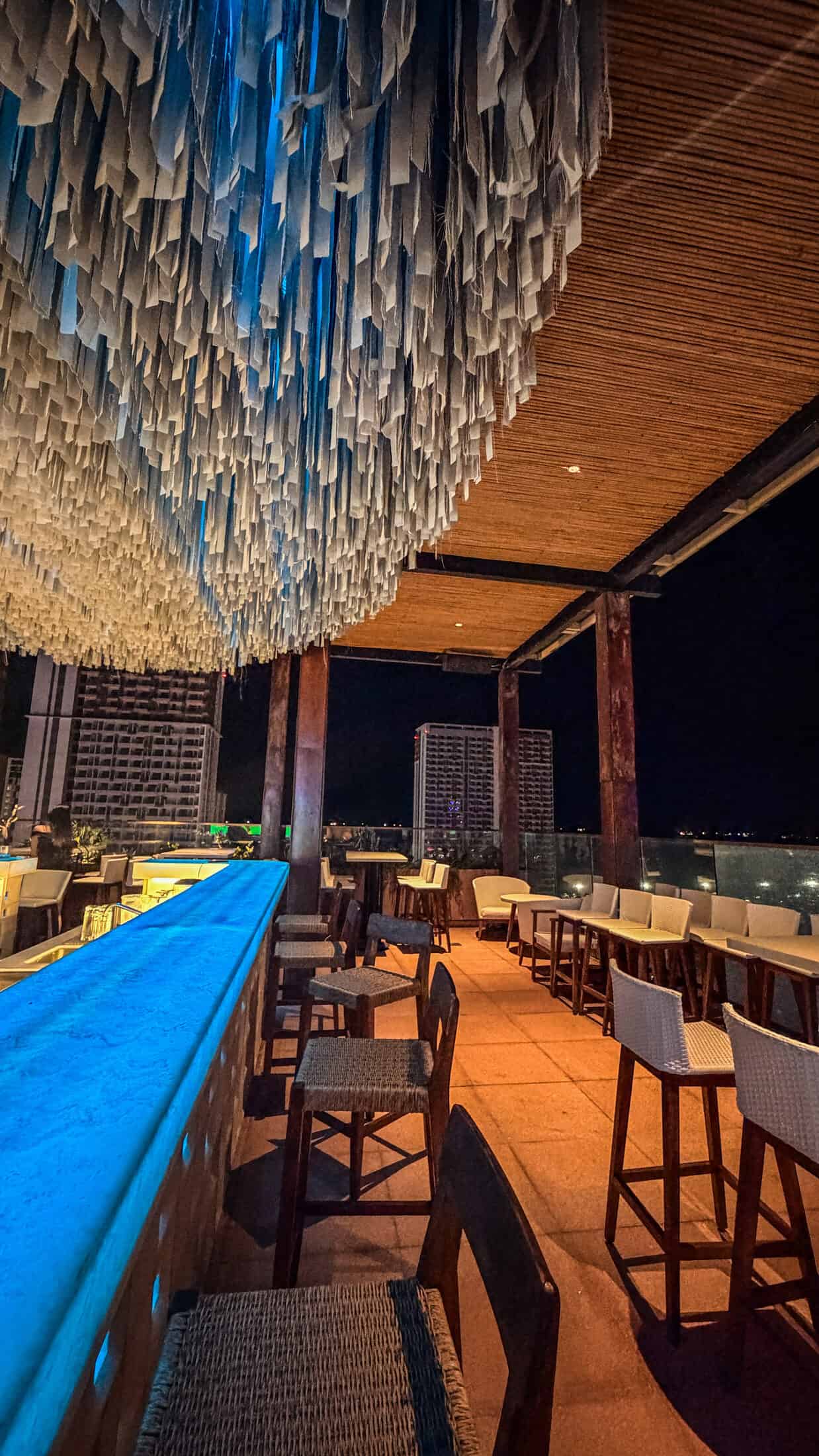 Glass railing and city view at Ruby Sky Bar & Restaurant, Quy Nhon