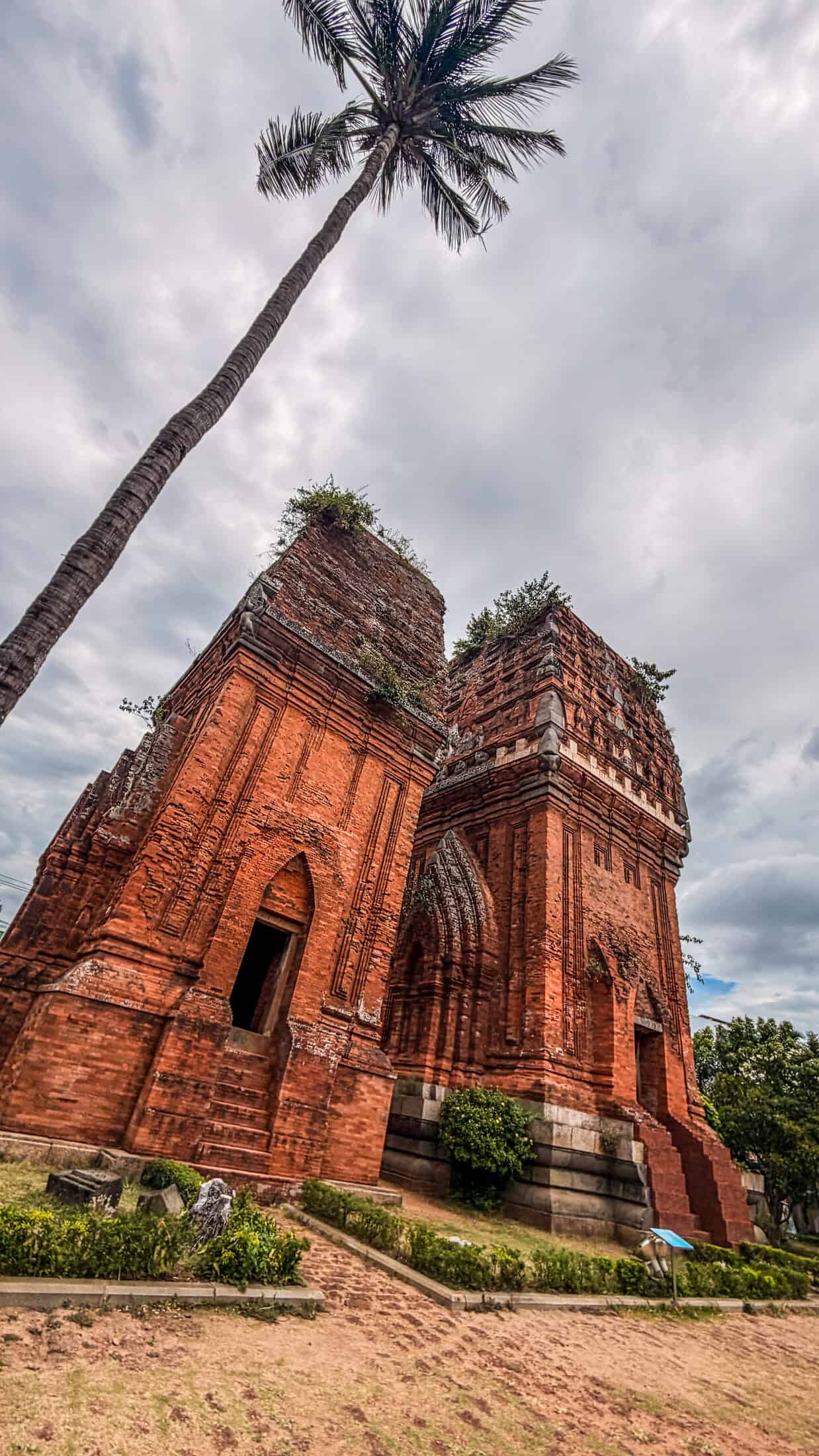 Tháp Đôi towers viewed across the park lawn, Quy Nhon